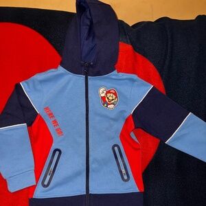 Super Mario set, Kid’s 6/7 track suit. Navy, lt. blue, red .  Jacket is a hoodie
